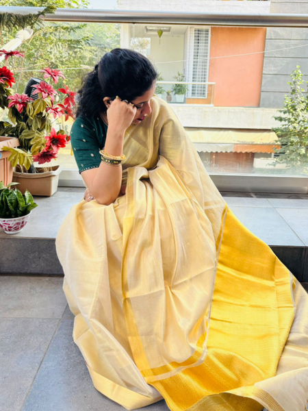 Cream Tissue Saree with Golden Jari Border