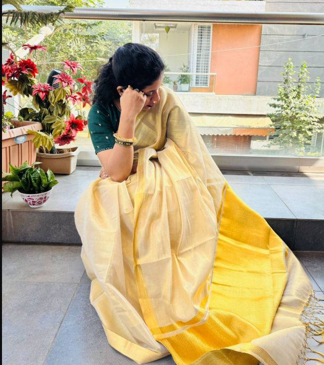 Cream Tissue Saree with Golden Jari Border