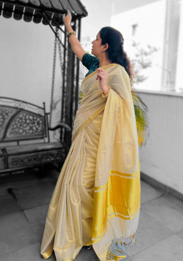 Cream Tissue Saree with Golden Jari Border