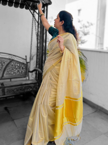 Cream Tissue Saree with Golden Jari Border
