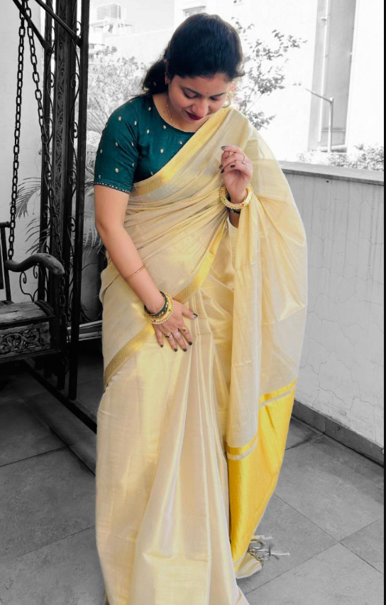 Cream Tissue Saree with Golden Jari Border