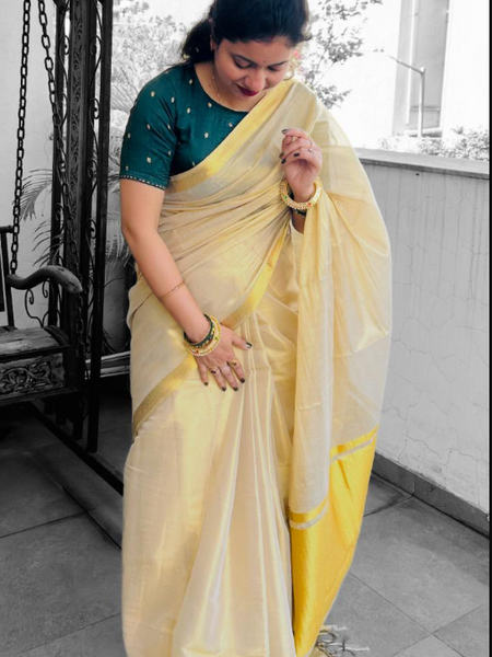 Cream Tissue Saree with Golden Jari Border